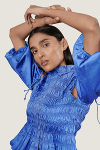 SMOCKED DETAIL PEPLUM TOP